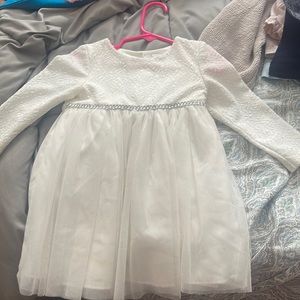 White formal/winter dress with white fur jacket.